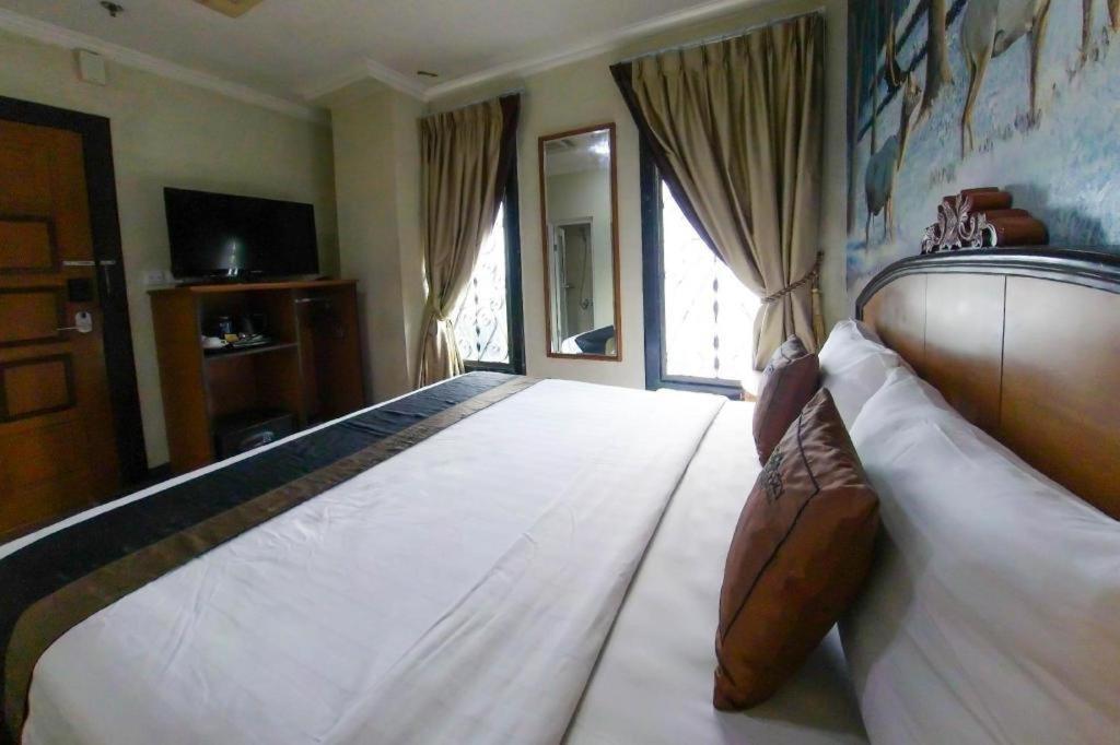 Amos Cozy Hotel Melawai Yakarta Exterior foto